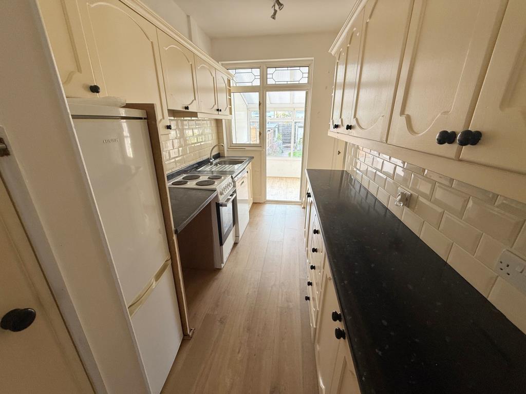 Lot: 59 - THREE-BEDROOM HOUSE FOR REPAIR AND IMPROVEMENT - Galley style kitchen